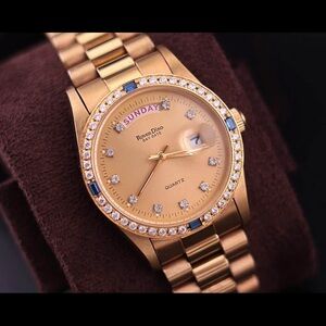 Vintage Roven Dino Men’s Watch
Gold Plated; Diamond-Set Bezel